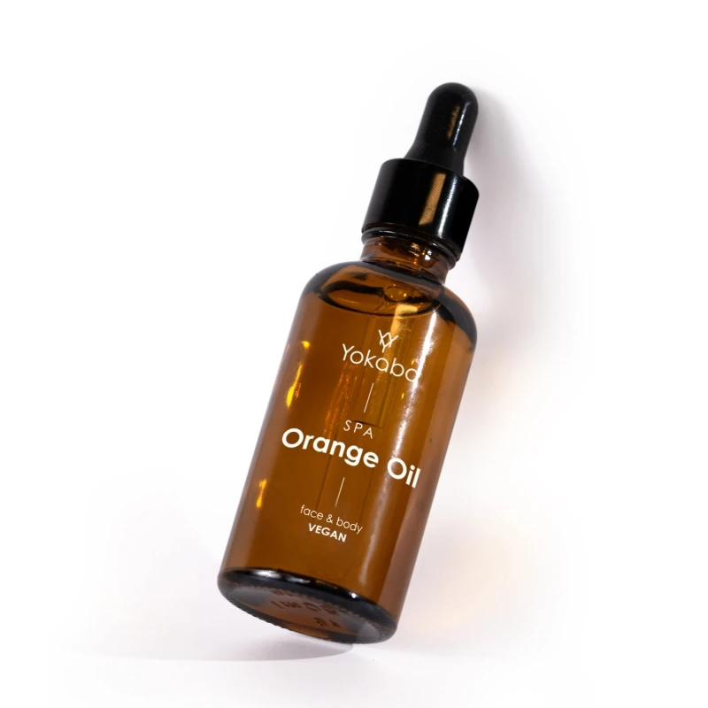 Butelka Yokaba Orange Oil 50 ml ustawiona pod skosem na białym tle, widoczna pipeta i etykieta