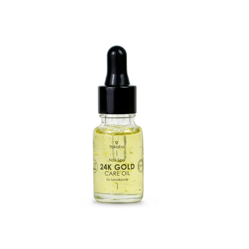 Yokaba 24k Gold Care Oil 10 ml - mała butelka z pipetą i płatkami złota na białym tle