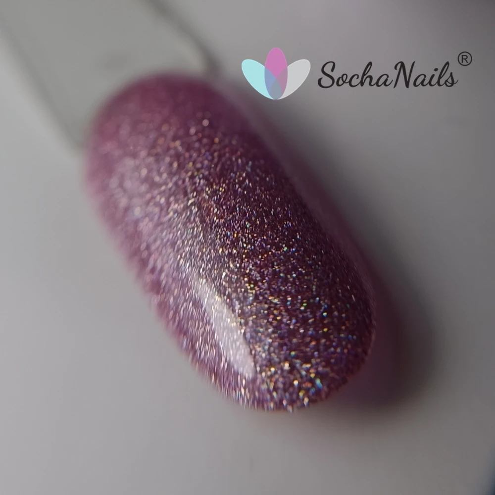 Manicure w kolorze Sentido 359 - chłodny róż z tęczowymi, pryzmatycznymi refleksami holo