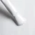 Elarto Lakier do stempli Stamp Nail Polish 01 White 7 ml - zbliżenie pędzelka z białym lakierem o kremowej konsystencji na białym tle