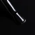 Elarto Lakier do stempli Stamp Nail Polish 02 Black 7 ml - zbliżenie pędzelka z czarnym lakierem na czarnym tle