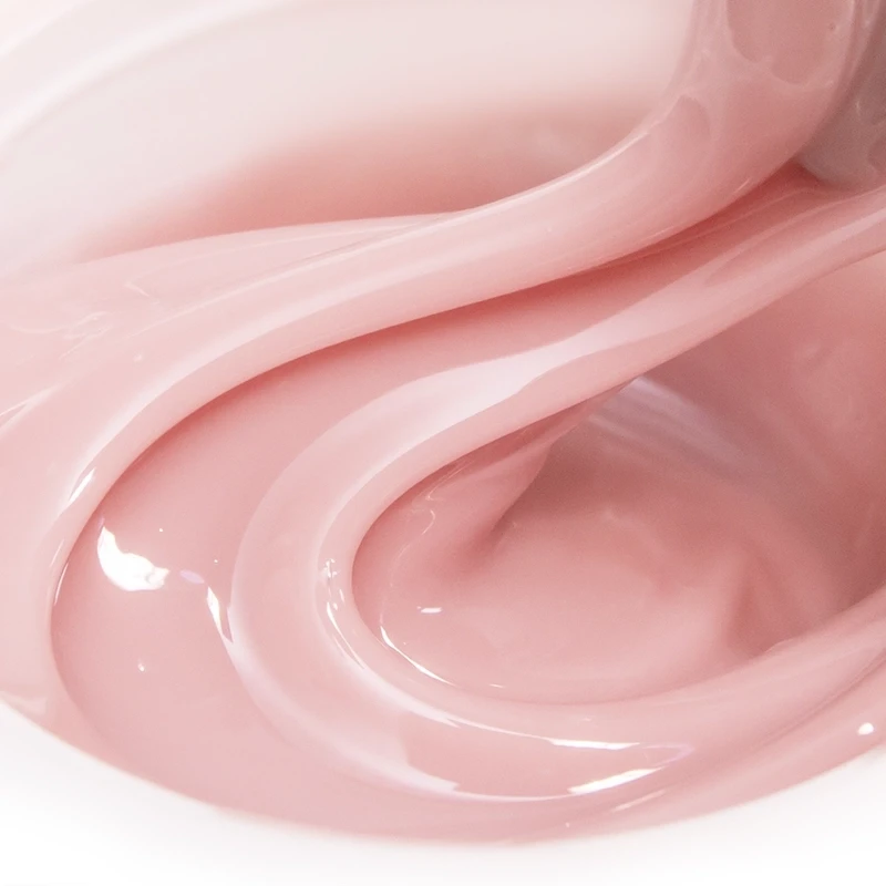 Elarto Candy Pink Apricot 50g - zbliżenie żelu budującego w ciepłym różowo-kremowym odcieniu apricot