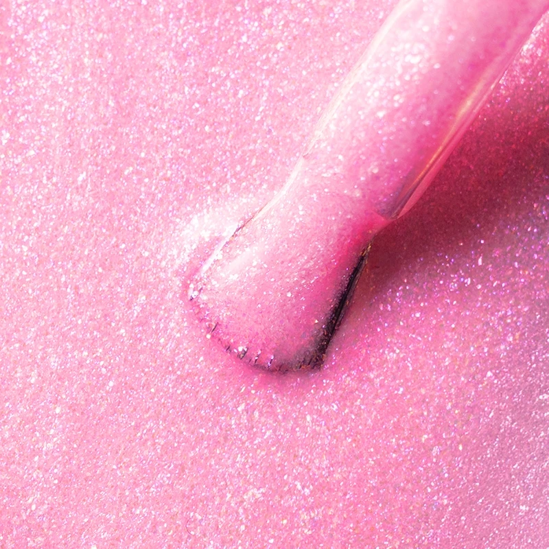 Lacogel Ultra Pink Glow nr 626 - zbliżenie na neopastelowy róż z opalizującymi różowymi drobinkami brokatu