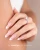 French manicure na bazie Makear 604 Milky French - liliowy roz z bialym usmiechem