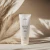 Tuba Yokaba PrebioFoot Cream 75 ml na beżowym tle z trawą pampasową
