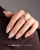 Dłoń z czarnym frenchem z żelu French Manicure Gel Black FG14 Makear 5 ml