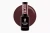 Victoria Vynn Gel Polish 480 Bordeaux 8 ml, butelka lakieru hybrydowego na tle bordowego wybarwienia