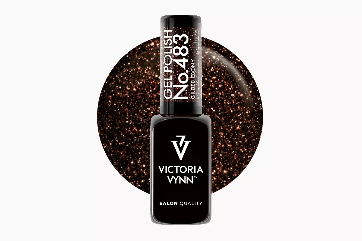 Victoria Vynn Gel Polish 483 Gilded Ebony 8 ml, butelka lakieru hybrydowego na tle ciemnobrązowego wybarwienia z miedzianym brokatem