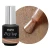 Elarto Top kocie oko i holo w jednym Catlight Cocoa 7ml - czarna butelka Dry Top ze srebrną nakrętką obok okrągłego kadru z pędzelkiem w brązowo-złotym topie z holograficznymi drobinami