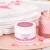 Słoik peelingu DERMA SCRAPER Pharm Foot 200 g na tacy z ręcznikiem i świecą