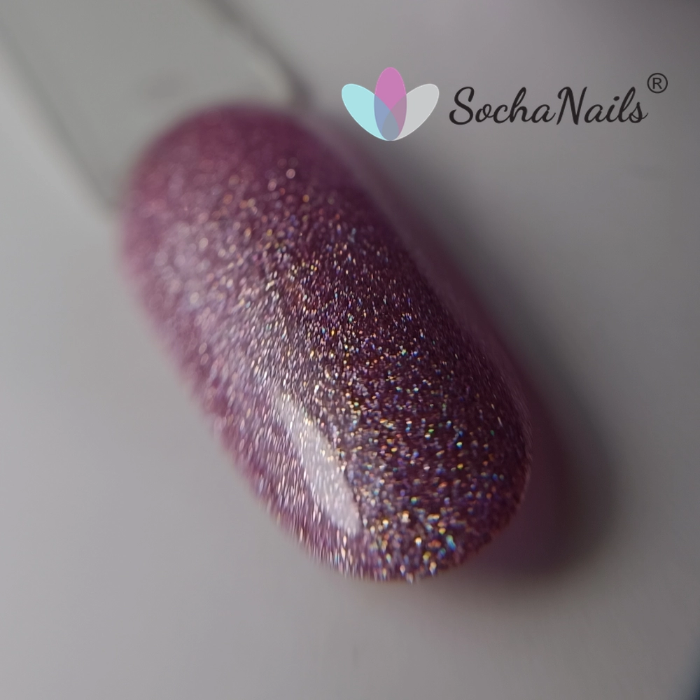 Manicure w kolorze Sentido 359 - chłodny róż z tęczowymi, pryzmatycznymi refleksami holo