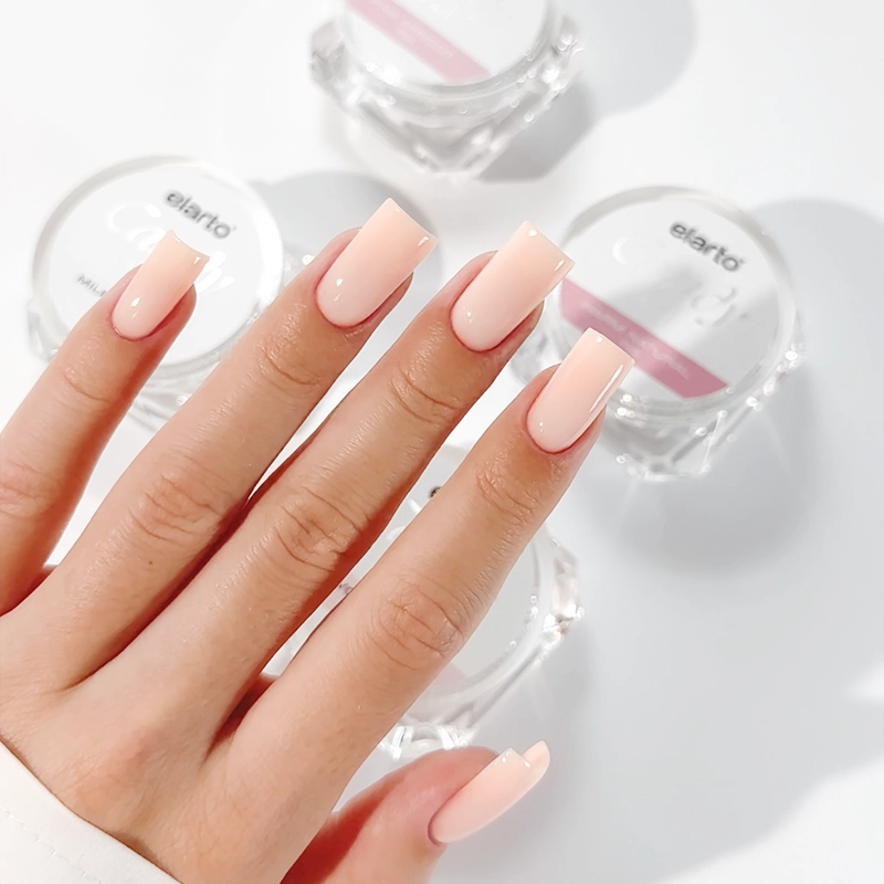 Candy Ivory Beige 50 g - swatch mleczno-beżowego żelu budującego kamuflaż na paznokciu