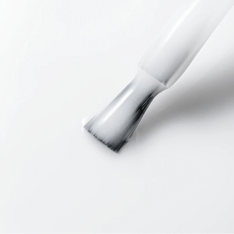 Acrylic Bottle Gel Milky Intense 15 ml - makro tekstury mlecznobiałego akrylożelu na pędzelku